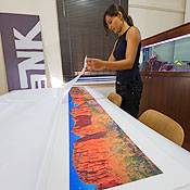 Soraya packs prints for shipping
